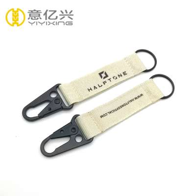 Black silkscreen printed logo grey fabric keychain with carabiner clasp